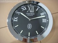 Cle De Cartier Wanduhr schwarzes Zifferblatt Edelstahl Cle De Cartier Wanduhr schwarzes Zifferblatt Edelstahl